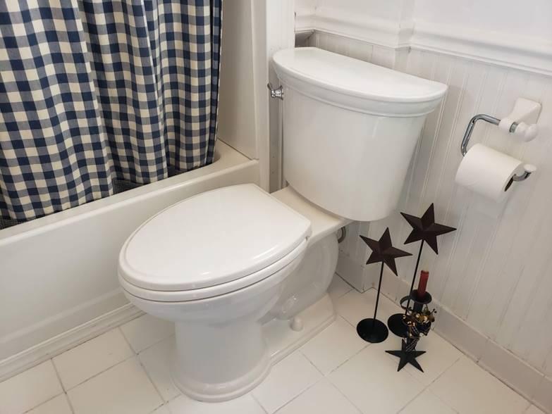 New white toilet seamlessly replaced in a customer's bathroom in Easton, PA by Applause Plumbing and Heating. Expert toilet replacement services ensuring a leak-free fit and optimal functionality. Meticulous attention to detail, including the installation of a new wax ring for a secure seal. Trust our skilled plumbers for top-notch plumbing solutions in Easton, PA.