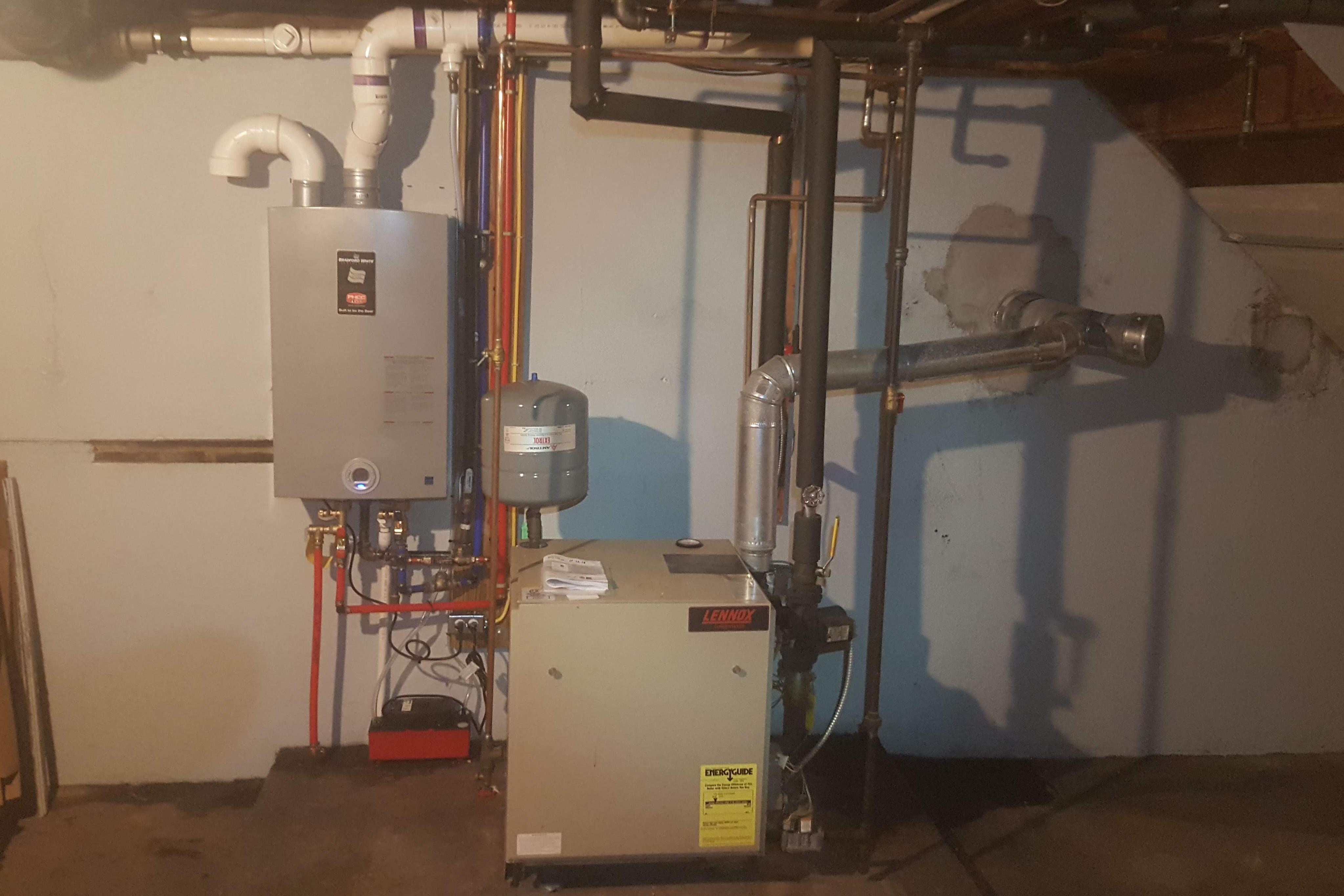 Tankless hot water system installation by Applause Plumbing and Heating in Easton, PA. Energy-efficient and space-saving solution for continuous hot water. Expert plumbing service for homes in Easton, PA. Contact us for reliable tankless water heater installation and maintenance. 